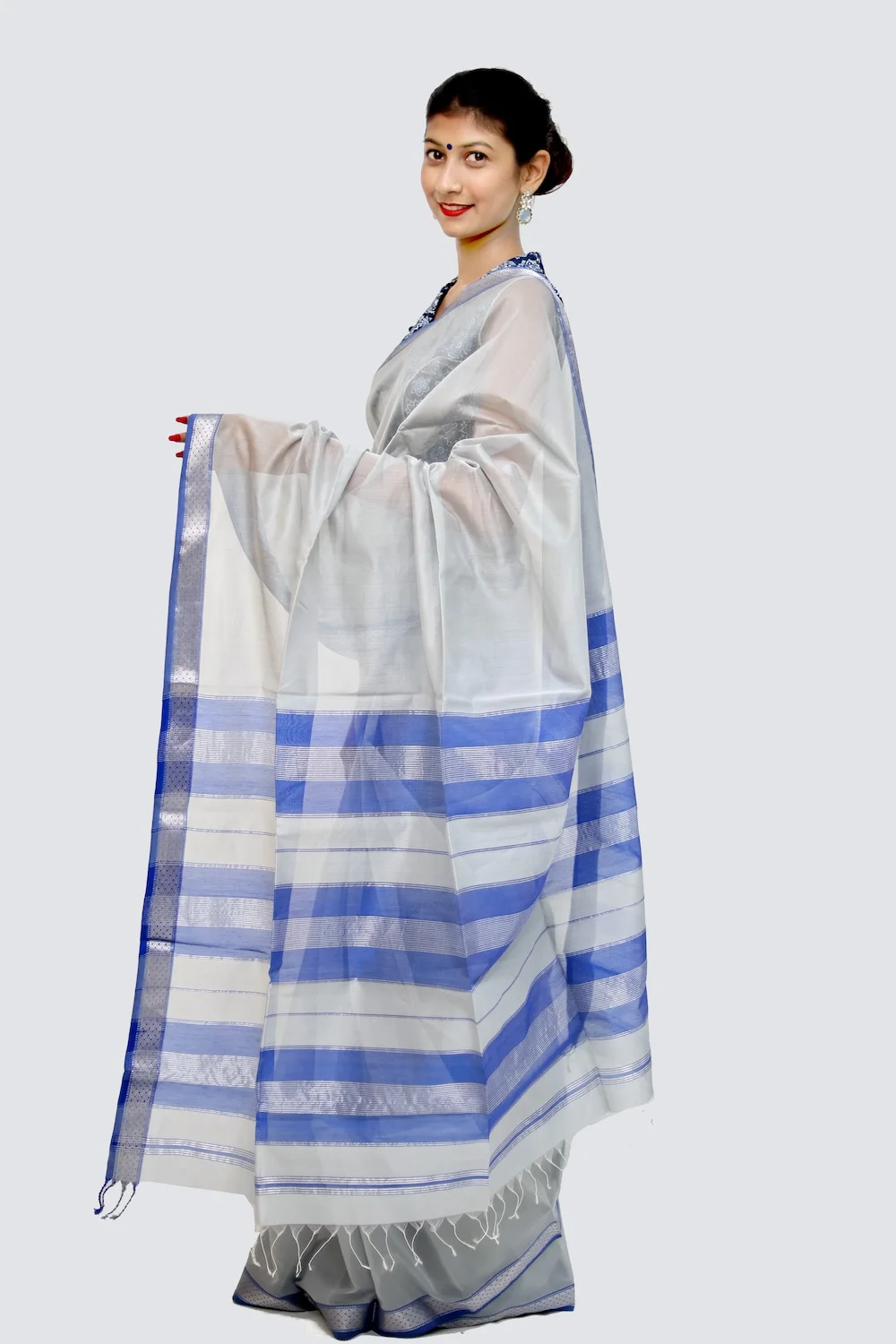 Epic Silver Brocade handwoven Saree with Tassels