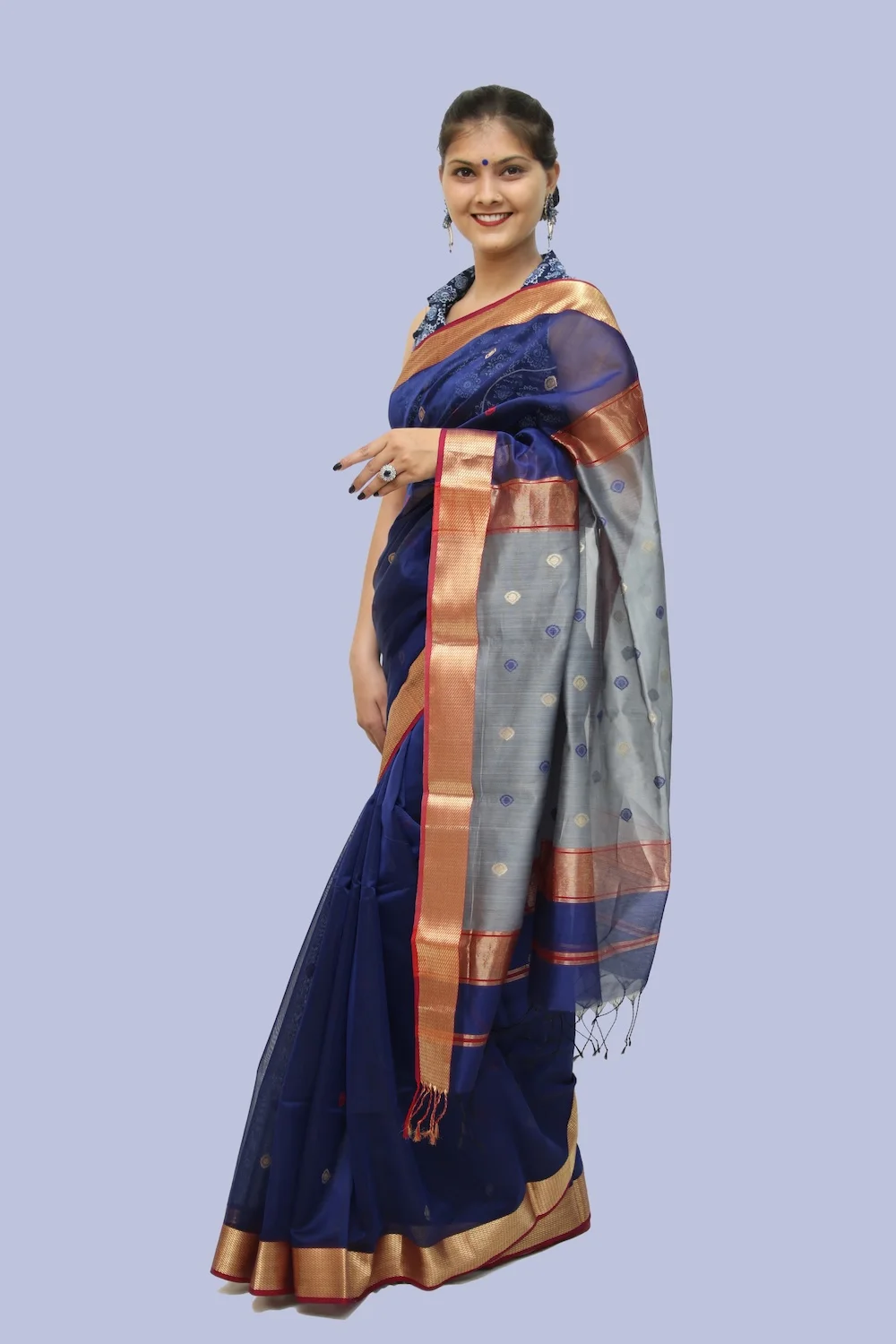 Vibrant Blue Drop motif handloom Saree with Tassels